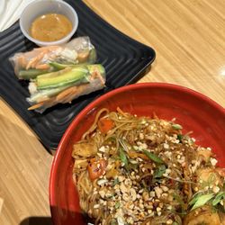 Pad Thai w/ Chicken and spring rolls.
