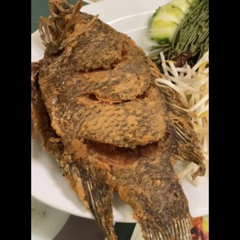Phnom Penh Restaurant - Fried fish w/tamarind sauce and veggies - Cambodian Near Me - Lowell, Massachusetts Phnom Penh Restaurant - Fried fish w/tamarind sauce and veggies - Cambodian Near Me - Lowell, Massachusetts