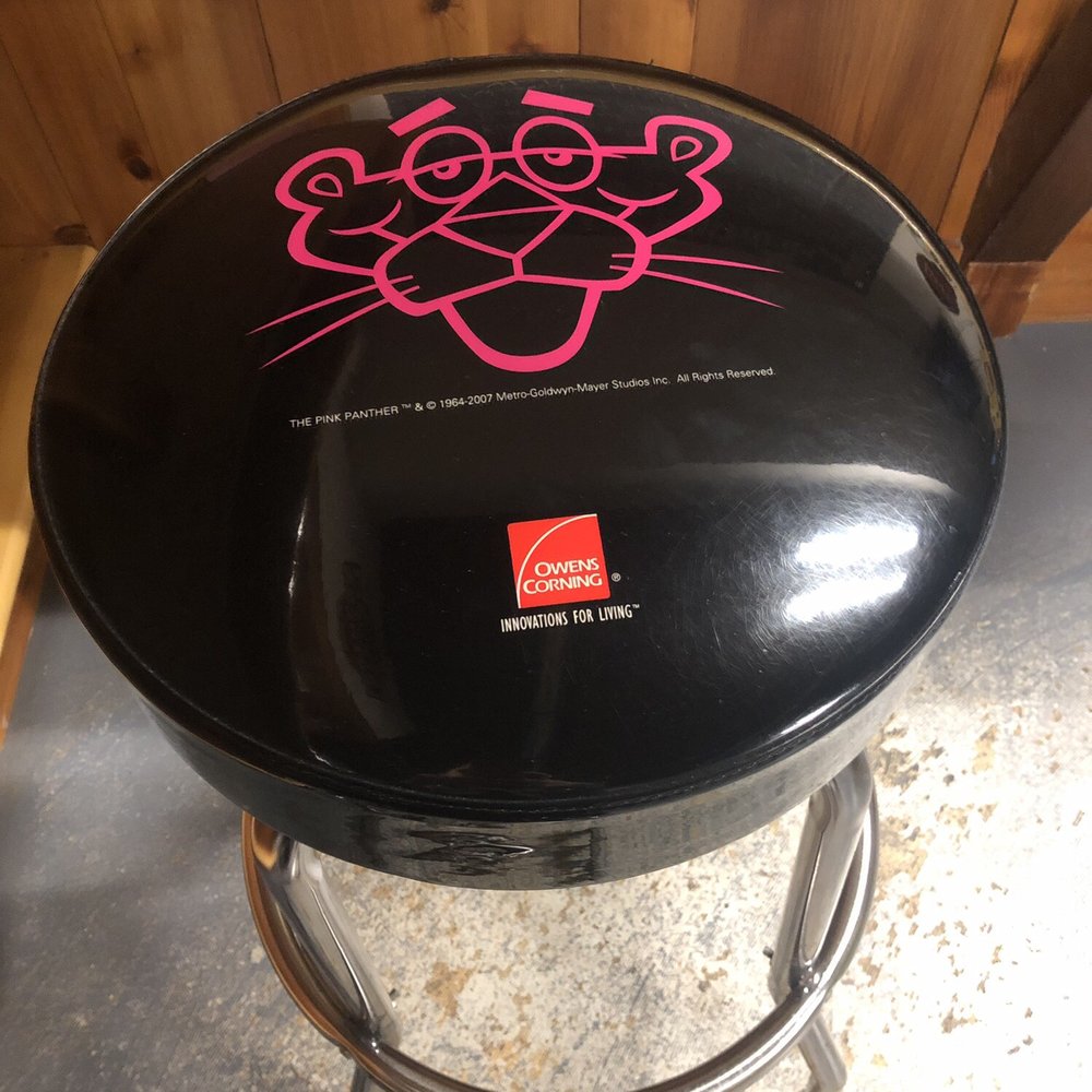 Petrucci Brothers Brewing - a black stool with a pink logo - Breweries Near Me - New Brighton, Pennsylvania Petrucci Brothers Brewing - a black stool with a pink logo - Breweries Near Me - New Brighton, Pennsylvania