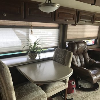 PPL Motor Homes - Dining room, had 4 chairs and table pulls out - RV Dealers Near Me - Houston, Texas PPL Motor Homes - Dining room, had 4 chairs and table pulls out - RV Dealers Near Me - Houston, Texas