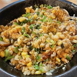 Sizzling eel rice - mixed with added green onions