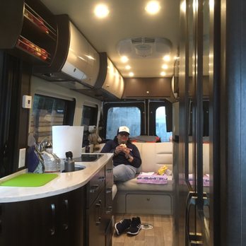 GoCamp - My wife sitting inside Sparkel enjoying the drive. - RV Rental Near Me - Portland, Oregon