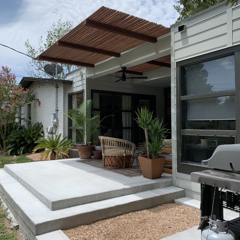 Capital City Tradesmen - Pergola cantilevers over back yard steps - General Contractors Near Me