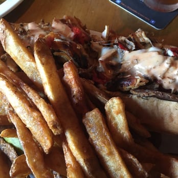 The Flying Pig Saloon - Barnyard sandwich almost off the plate - Pubs Near Me - Malvern, Pennsylvania