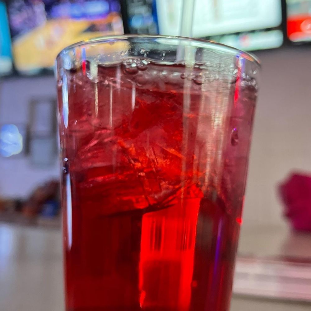 Skyline Street Bar - a red drink with ice in a tall glass - Cocktail Bars Near Me - El Paso, Texas
