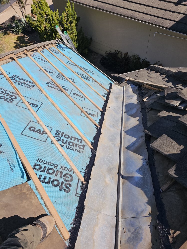 Slide of Arbiter Roofing