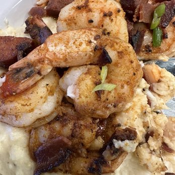Melbourne Kitchen - I almost forgot to take photos... This was a huge bowl of shrimp and grits with andouille sausage. Absolutely delicious. - Comfort Food Near Me - Melbourne, Florida