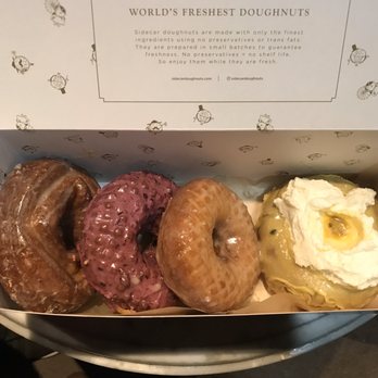 Sidecar Doughnuts & Coffee - From left to right: Old Fashion, Huckleberry, Butter & Salt, Passion Fruit Pavlova (Jan 2020 flavor) - Donuts Near Me - Costa Mesa, California