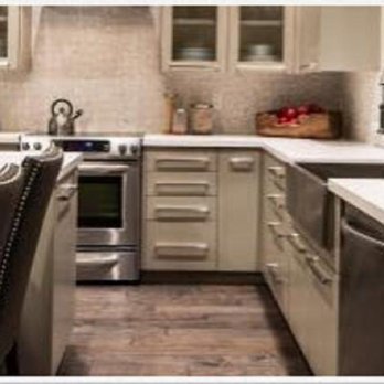 Under The Sun Home Renovations - a kitchen with stainless steel appliances - General Contractors Near Me Under The Sun Home Renovations - a kitchen with stainless steel appliances - General Contractors Near Me
