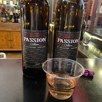 Passion Cellars - two bottles of passion and a glass of wine - Wine Tasting Room Near Me - Bisbee, Arizona Passion Cellars - two bottles of passion and a glass of wine - Wine Tasting Room Near Me - Bisbee, Arizona