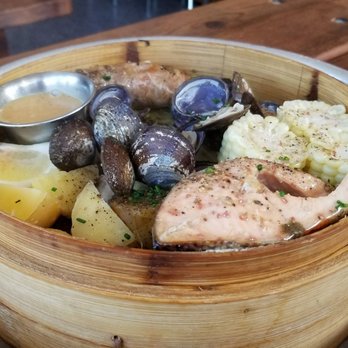 Fish - Off the chalkboard.  Split 3 ways & we each also got chowder.  Steamed clams, rainbow trout steak, house-made sausage, corn, potatoes. - Seafood Near Me - Sausalito, California