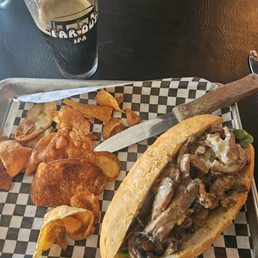 Steak Sandwich with Haus-made chips.