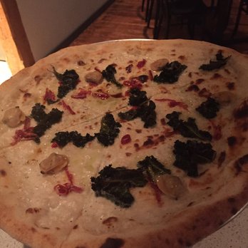 Nicky's Coal Fired - White pie: clams, kale, pepper - Pizza Near Me - Nashville, Tennessee Nicky's Coal Fired - White pie: clams, kale, pepper - Pizza Near Me - Nashville, Tennessee