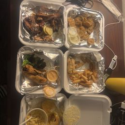 BBQ sampler, fries, mac-n-cheese, and fried pickles BBQ sampler, fries, mac-n-cheese, and fried pickles