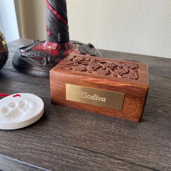 Serenity Pets - Wooden urn box, paw print ornament - Pet Cremation Services Near Me - Durham, North Carolina Serenity Pets - Wooden urn box, paw print ornament - Pet Cremation Services Near Me - Durham, North Carolina