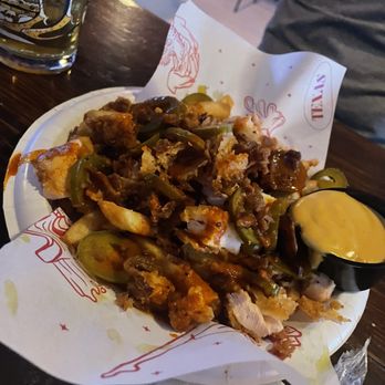 LadyBird Beer Garden - loaded fries with the queso on the side - Bars Near Me - San Antonio, Texas LadyBird Beer Garden - loaded fries with the queso on the side - Bars Near Me - San Antonio, Texas