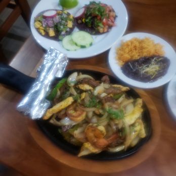 Uncle Ricos Cantina - Trio Fajitas and two tacos - Tex-Mex Near Me - Manassas, Virginia Uncle Ricos Cantina - Trio Fajitas and two tacos - Tex-Mex Near Me - Manassas, Virginia