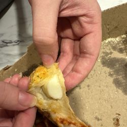 Domino's Pizza - Solid mozzarella stuffed crust underbaked