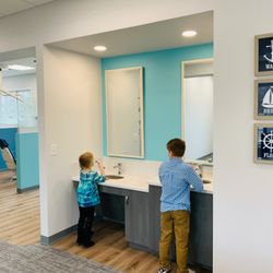 Harbor Pediatric Dentistry - Tooth brushing station at Harbor Pediatric Dentistry