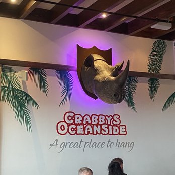 Crabby's Oceanside - Rhino on the wall inside. - Seafood Near Me - Daytona Beach, Florida