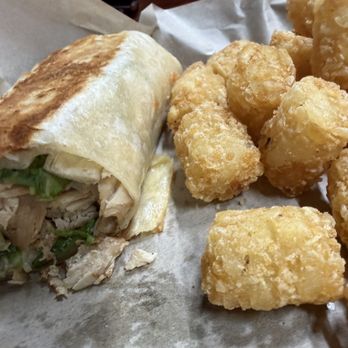 Franks At Cane Hollow RV - Chicken Caesar wrap (I already ate the other half) and tater tots - RV Parks Near Me - Sparta, Tennessee