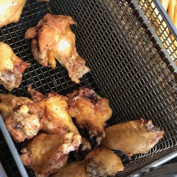 Pub at PGC - a basket of chicken wings and french fries - Sports Bars Near Me - Portland, Connecticut Pub at PGC - a basket of chicken wings and french fries - Sports Bars Near Me - Portland, Connecticut