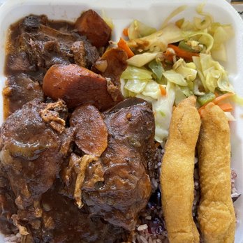 One876 Caribbean Restaurant - Brown Stew Chicken with vegetables, carnival, rice and peas - Caribbean Near Me - Chatsworth, California One876 Caribbean Restaurant - Brown Stew Chicken with vegetables, carnival, rice and peas - Caribbean Near Me - Chatsworth, California