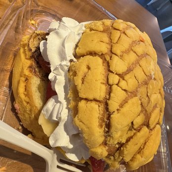 Dulce Café - Concha filled with whip strawberries and  Nutella - Coffee & Tea Near Me - Puyallup, Washington