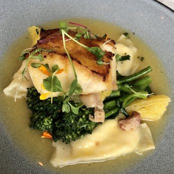 M Waterfront Grille - Sea bass w goat cheese pierogi. - New American Near Me - Naples, Florida M Waterfront Grille - Sea bass w goat cheese pierogi. - New American Near Me - Naples, Florida