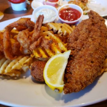 Fish City Grill - Pick two combo- fried catfish and fried shrimp with waffle fries. - Seafood Near Me - Flower Mound, Texas Fish City Grill - Pick two combo- fried catfish and fried shrimp with waffle fries. - Seafood Near Me - Flower Mound, Texas
