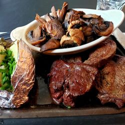 Haase's Supper Club - Half order of "Tenderloin for Two" wuth a baked potato and additional side of sautéed mushrooms