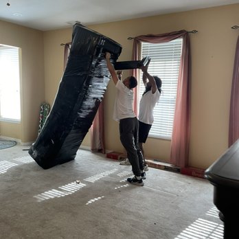 Apex Moving - A 3 piece reclining sofa wrapped into one. We're not afraid of the heavy lifting! - Packing Services Near Me Apex Moving - A 3 piece reclining sofa wrapped into one. We're not afraid of the heavy lifting! - Packing Services Near Me