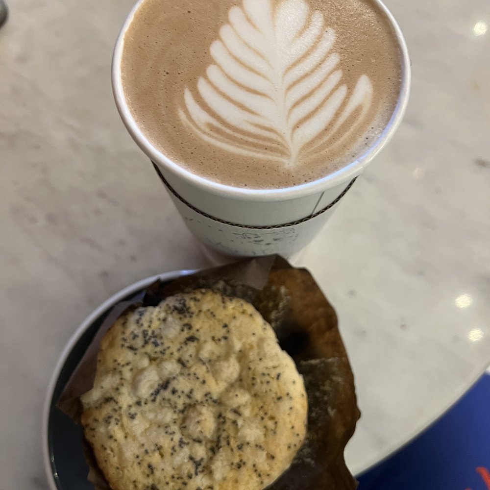 Overwinter Coffee - My beautiful mocha and lemon poppyseed muffin. - Coffee & Tea Near Me - Williamsville, New York Overwinter Coffee - My beautiful mocha and lemon poppyseed muffin. - Coffee & Tea Near Me - Williamsville, New York