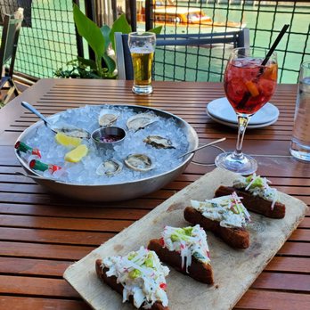River Roast - oysters, toast, and view - American Near Me - Chicago, Illinois River Roast - oysters, toast, and view - American Near Me - Chicago, Illinois