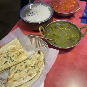 Persis Biryani Indian Grill - Butter chicken (top) and saag paneer (bottom) - Indian Near Me - Columbia, South Carolina Persis Biryani Indian Grill - Butter chicken (top) and saag paneer (bottom) - Indian Near Me - Columbia, South Carolina