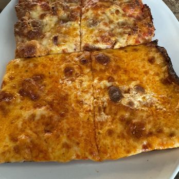 SQR Artisan Pizza - Two slices cut in half. One is the Spicy Chicken Parmigianoand the other is the Vodka Pizza. - Pizza Near Me - Summit, New Jersey