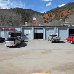 Nelson's Auto Body - Check out our Time/Temp sign on the corner of our building as you drive by as well, At the CMC Turnoff