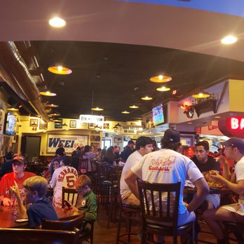 Fenway Johnnie's - a large group of people sitting at tables - Sports Bars Near Me - Boston, Massachusetts Fenway Johnnie's - a large group of people sitting at tables - Sports Bars Near Me - Boston, Massachusetts