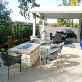 Rivers Landscape Construction - North side of yard with new landscape new firepit, new gabled patio with stone column posts and bar/counter at far side. - Masonry/Concrete Near Me - Escondido, California