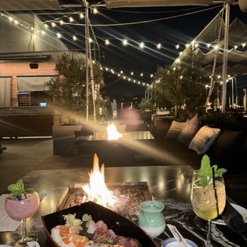 Mya Rooftop - Sushi Boat, Blueberry dream (mocktail), Spritz - Cocktail Bars Near Me - Glendale, California Mya Rooftop - Sushi Boat, Blueberry dream (mocktail), Spritz - Cocktail Bars Near Me - Glendale, California