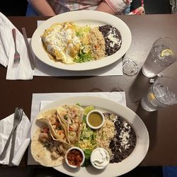 Ontario Hotel - Enchilada with chicken and shrimp tacos served with black beans and rice