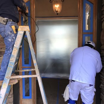 Jimenez Construction - two men working on a doorway - General Contractors Near Me - Douglasville, Georgia