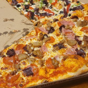 Burattino Brick Oven Pizza - Half meat lovers, and half something else I didn't try. Lol - Pizza Near Me - Carson, California Burattino Brick Oven Pizza - Half meat lovers, and half something else I didn't try. Lol - Pizza Near Me - Carson, California