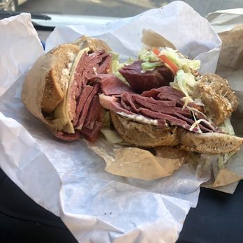 Knickerbocker Bagel - Corned beef with Swiss on whole wheat everything bagel lettuce tomato mayo - Wraps Near Me - Brooklyn, New York Knickerbocker Bagel - Corned beef with Swiss on whole wheat everything bagel lettuce tomato mayo - Wraps Near Me - Brooklyn, New York