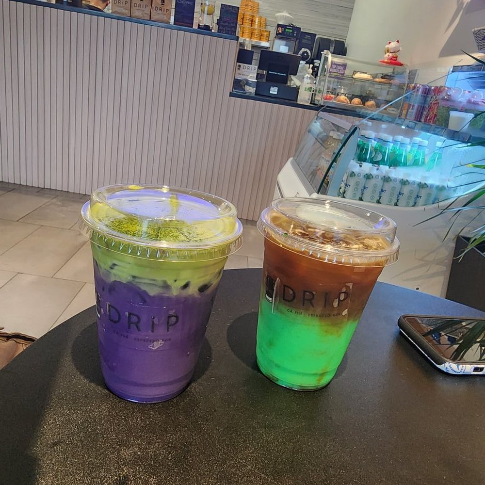 DRiP Cà Phê - Ube matcha cloud (left) and pandan espresso latte (right) - Coffee & Tea Near Me - Annandale, Virginia DRiP Cà Phê - Ube matcha cloud (left) and pandan espresso latte (right) - Coffee & Tea Near Me - Annandale, Virginia