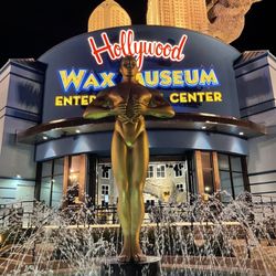 Hollywood Wax Museum - Outside; impeccable lighting and fountain