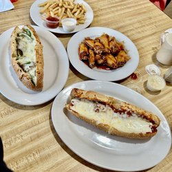 Tina's Pizza Cafe & Restaurant - This was breakfast, lunch and dinner for me and my family the portions super generous.