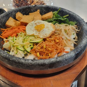 GOGI - Phoenix - a bowl of food on a table - Korean Near Me - Phoenix, Arizona GOGI - Phoenix - a bowl of food on a table - Korean Near Me - Phoenix, Arizona