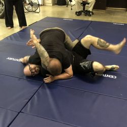American Ninjutsu - Mr. Kyle demonstrating ground defense techniques at a seminar