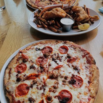 Federal Taphouse - "3 little pigs pizza" (normal crust on top pizza, cauliflower crust on bottom pizza) and "fish and chips" - Pizza Near Me - State College, Pennsylvania
